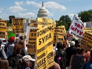 Акция протеста против войны в Сирии перед Белым домом в США