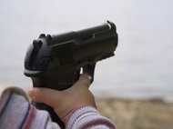 Ребенок с пистолетом